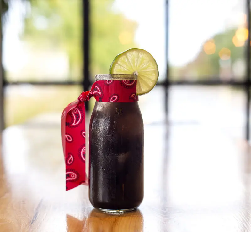 Drink photography of a garnished beverage at a restaurant in Arkansas.