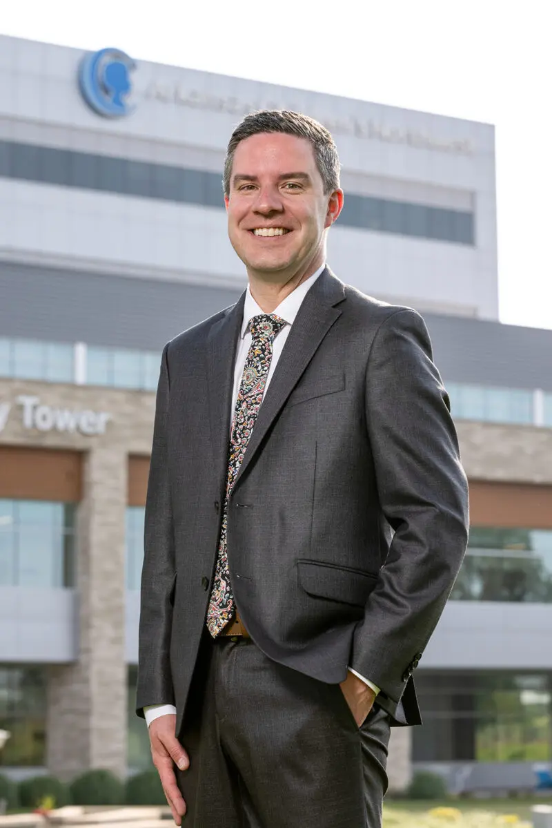 Portrait of an executive at Arkansas Children’s Hospital, photographed in Northwest Arkansas by commercial photographer Beth Hall taken outside the hopital.