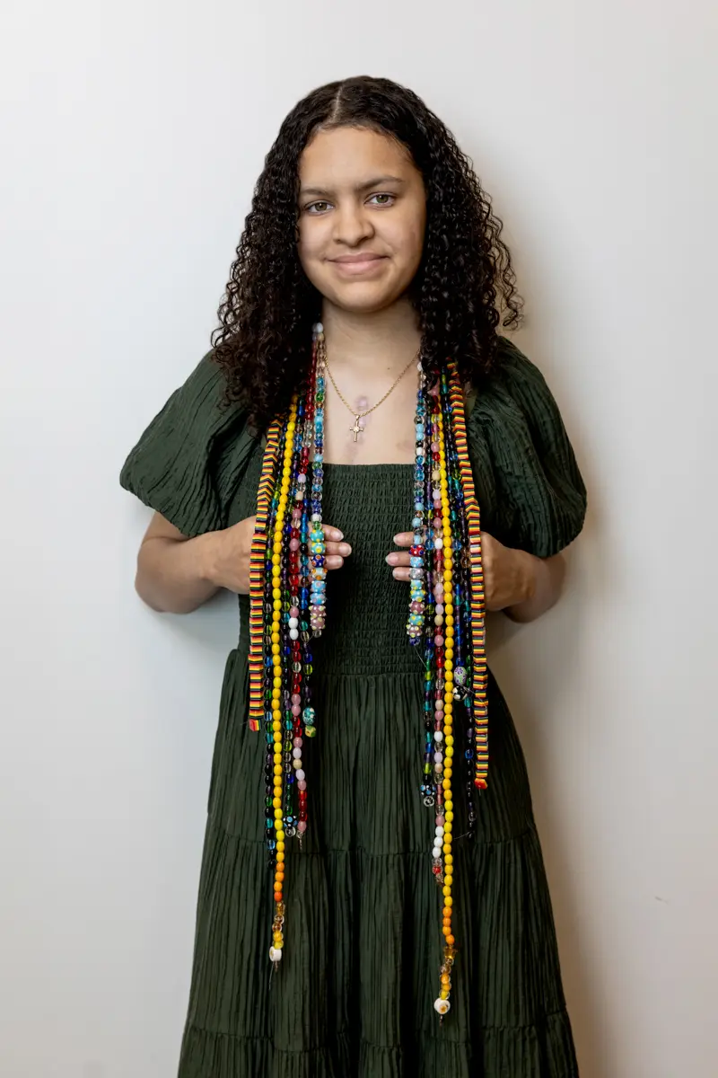 Studio portrait of the 2025 champion child for Arkansas Children’s Hospital, photographed in Northwest Arkansas by commercial photographer Beth Hall against a white background.