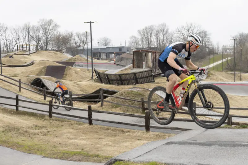 Mountain bikers at the Railyard Bike Park in Rogers, Ark.