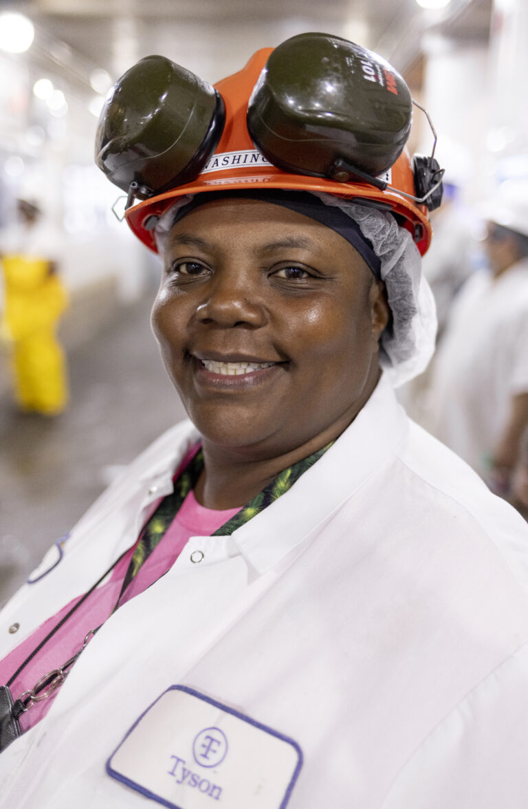 Portrait of an employee in between shifts at a meat processing plant.