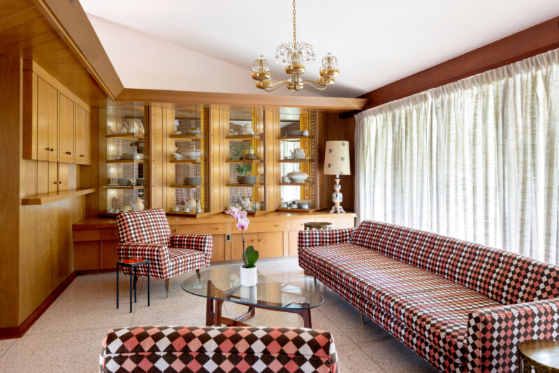 Interior photography of a mid-century modern home with a checkered couch.