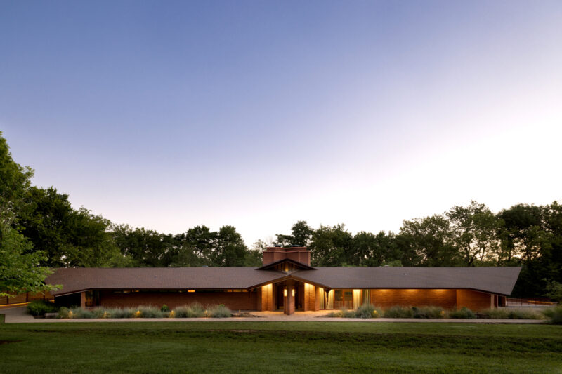 The entrance to a red brick home designed by E Fay Jones.