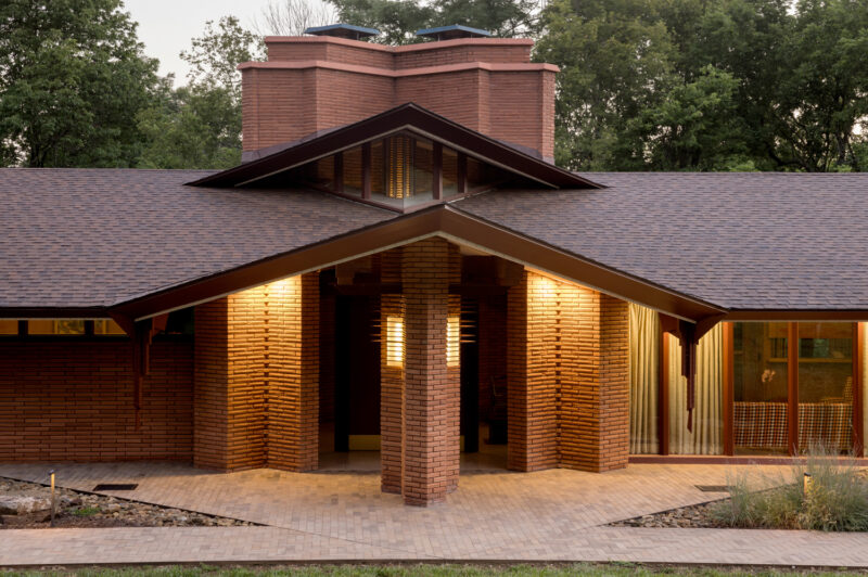 The entrance to a red brick home designed by E Fay Jones.